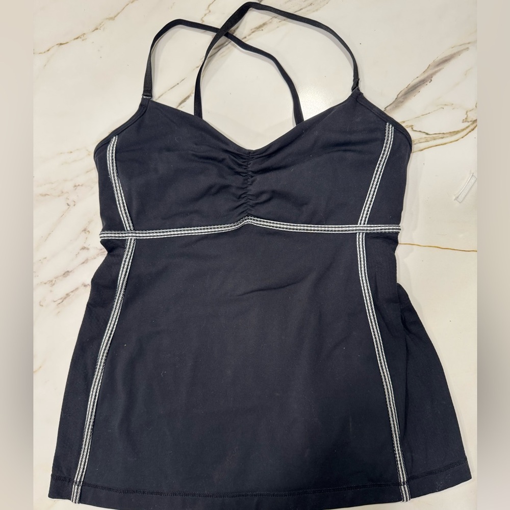 Lululemon Black Strappy Top with White stitching and built-in bra. Size 10.